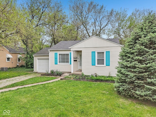 bungalow-style house featuring driveway, cooling unit, a front lawn, and a garage