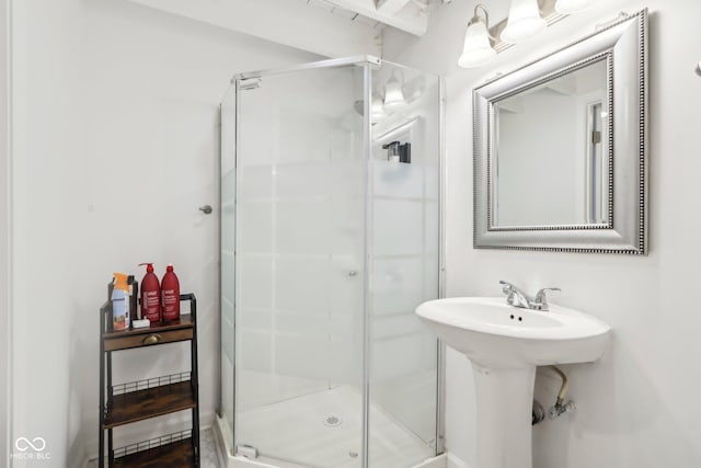 full bathroom with a shower stall