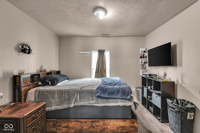 bedroom with a textured ceiling