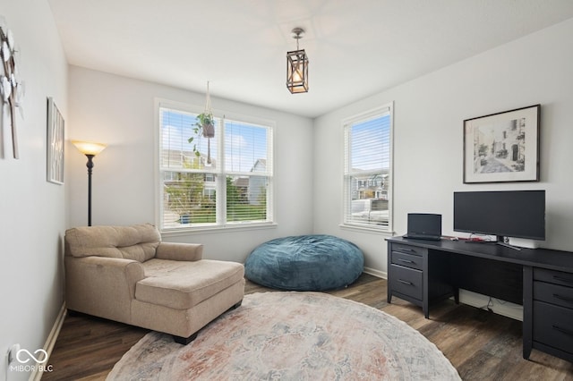 home office with baseboards and dark wood-style floors