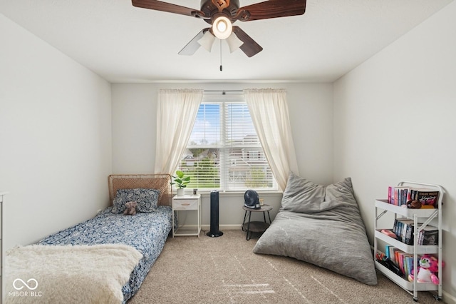 bedroom featuring baseboards, a ceiling fan, and carpet floors