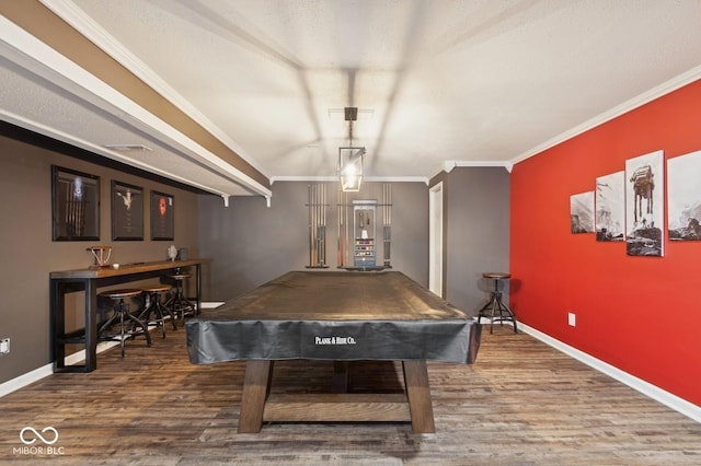 game room with billiards, crown molding, baseboards, and wood finished floors