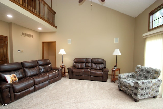 carpeted living room featuring recessed lighting, baseboards, ceiling fan, visible vents, and high vaulted ceiling