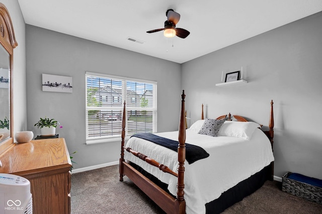 carpeted bedroom with ceiling fan, baseboards, and visible vents