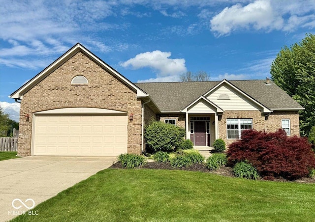 single story home featuring brick siding, concrete driveway, and a front yard