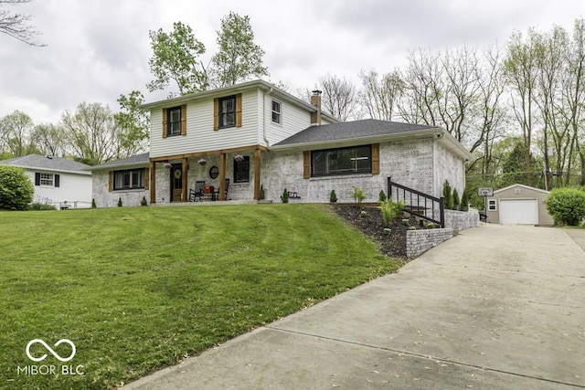 view of front facade featuring covered porch, a chimney, an outdoor structure, driveway, and a detached garage