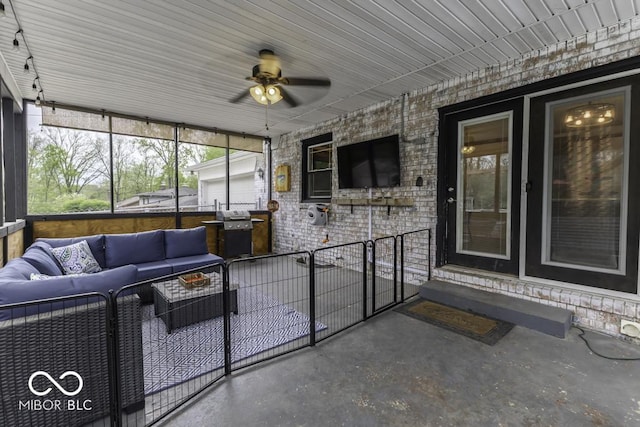 view of patio featuring an outdoor living space, grilling area, and fence