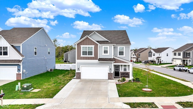 traditional home featuring board and batten siding, driveway, brick siding, a garage, and a residential view