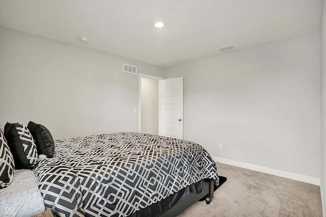 carpeted bedroom featuring baseboards, recessed lighting, and visible vents