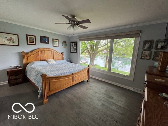 bedroom featuring baseboards, ornamental molding, dark wood-style floors, and a ceiling fan