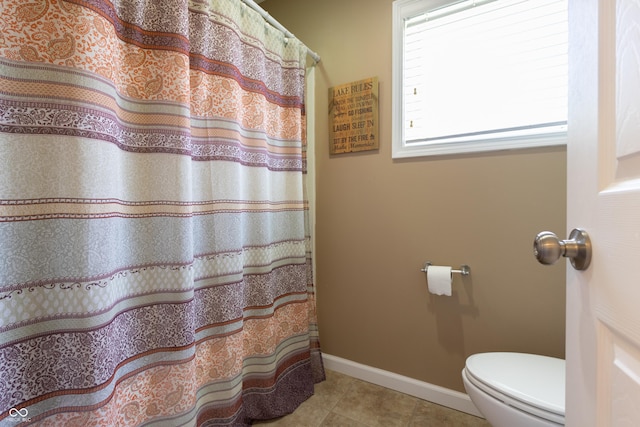 3829 Waycross Dr, Columbus, IN 47203 - bathroom with baseboards, toilet, tile patterned floors, and a shower with shower curtain