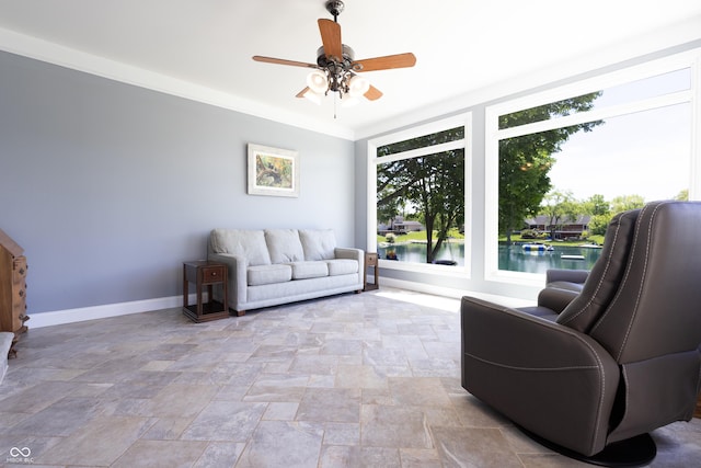 3829 Waycross Dr, Columbus, IN 47203 - living room featuring light stone finish flooring, baseboards, and ceiling fan