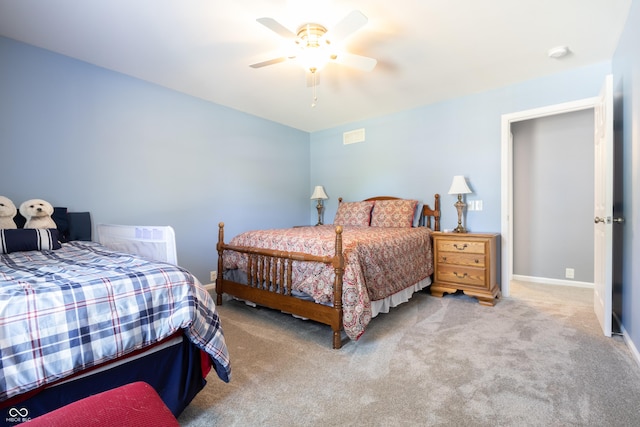 3829 Waycross Dr, Columbus, IN 47203 - carpeted bedroom featuring a ceiling fan and baseboards