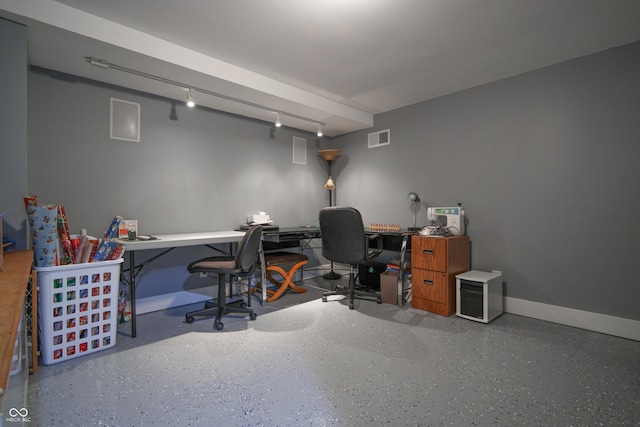 3829 Waycross Dr, Columbus, IN 47203 - office featuring speckled floor, track lighting, and baseboards