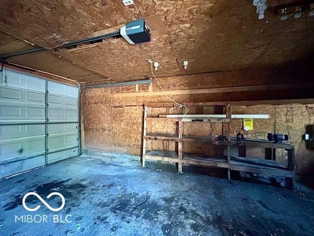 2701 N Gale St, Indianapolis, IN 46218 - garage featuring a garage door opener
