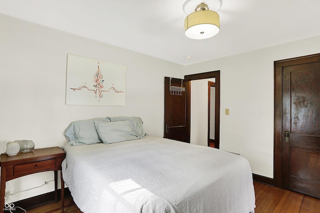 bedroom with wood finished floors