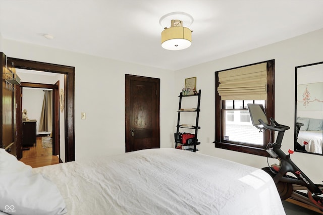 bedroom with wood finished floors