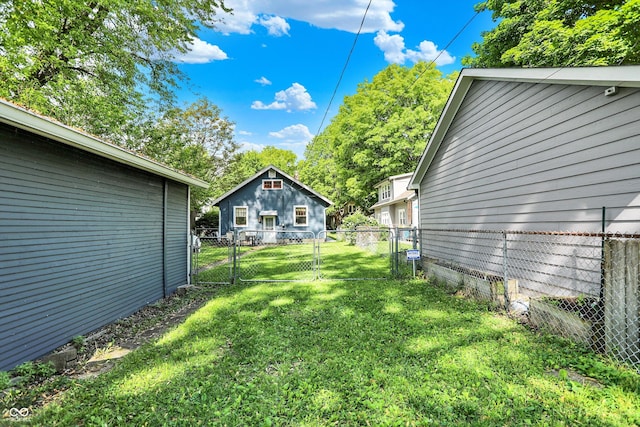view of yard with a gate