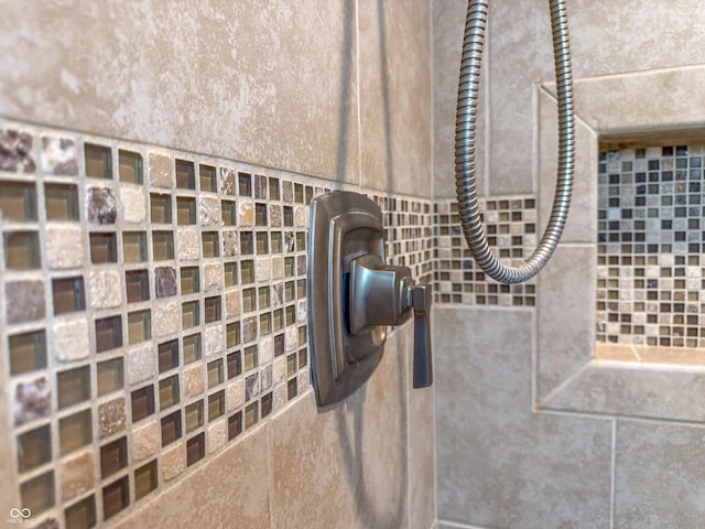 bathroom view of tiled shower