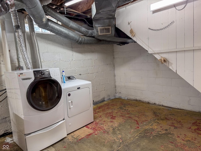 washroom featuring independent washer and dryer