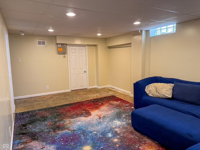 sitting room with a paneled ceiling, baseboards, and recessed lighting