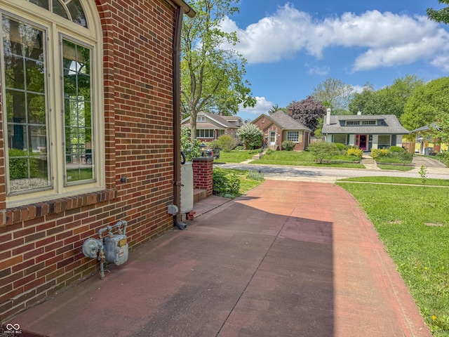 view of patio / terrace with a residential view