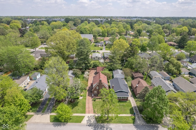 aerial overview of property's location with nearby suburban area