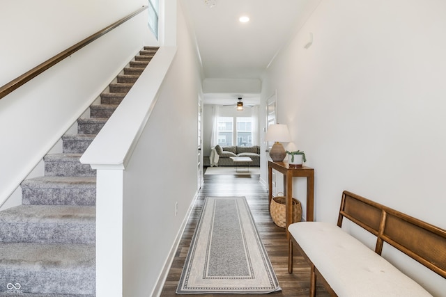 stairs with wood finished floors, baseboards, ceiling fan, and recessed lighting