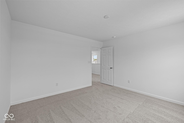 6219 Medina Spirit Dr, Indianapolis, IN 46237 - empty room with baseboards and carpet flooring