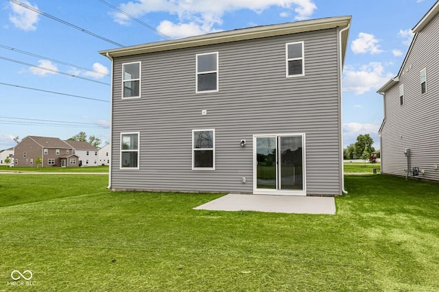 6219 Medina Spirit Dr, Indianapolis, IN 46237 - rear view of house featuring a patio and a lawn