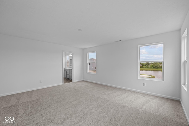 6219 Medina Spirit Dr, Indianapolis, IN 46237 - empty room featuring carpet and baseboards