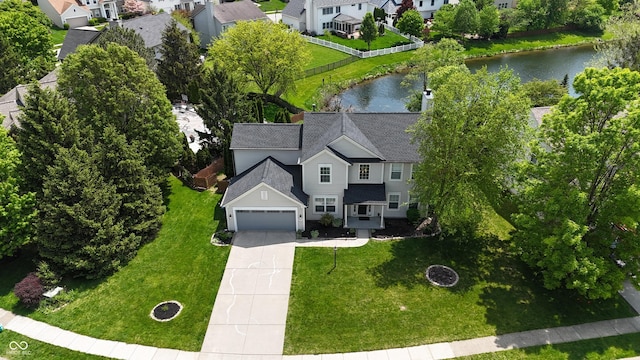 aerial view of residential area with a nearby body of water