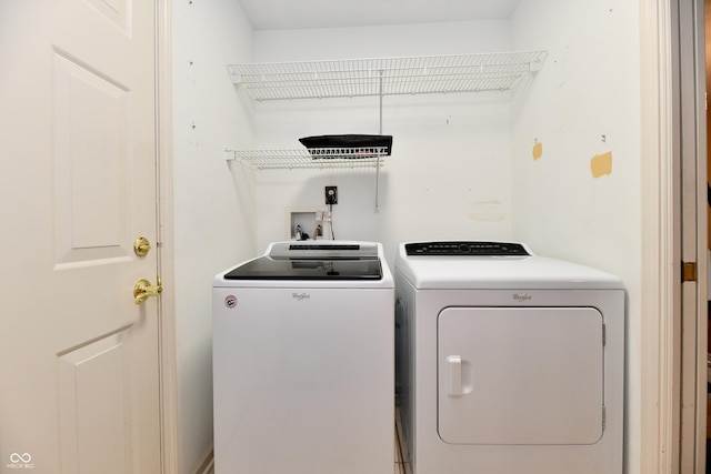 10713 Stable Dr, Indianapolis, IN 46239 - clothes washing area featuring washer and dryer