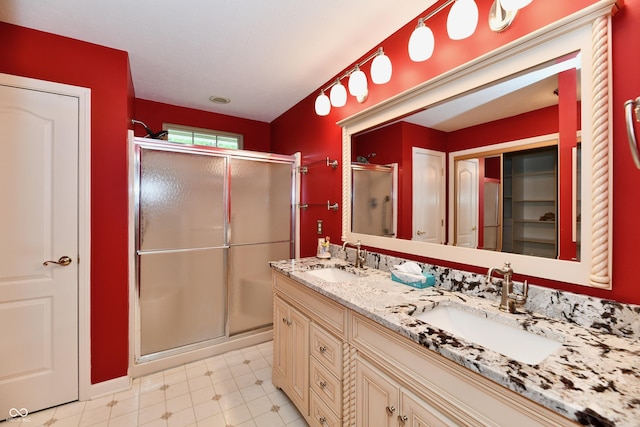 10713 Stable Dr, Indianapolis, IN 46239 - full bathroom with a shower stall and double vanity