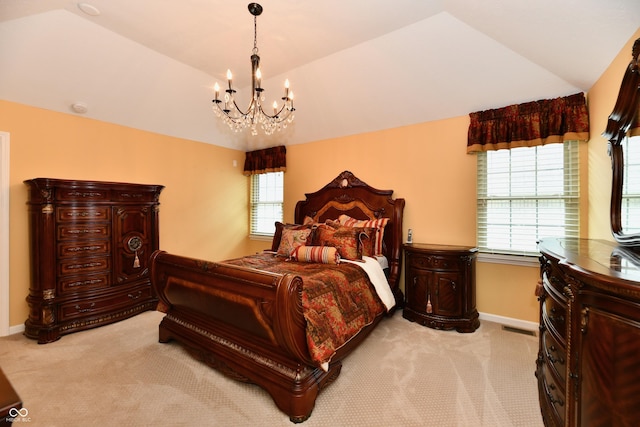 10713 Stable Dr, Indianapolis, IN 46239 - bedroom featuring light colored carpet, a chandelier, lofted ceiling, multiple windows, and baseboards