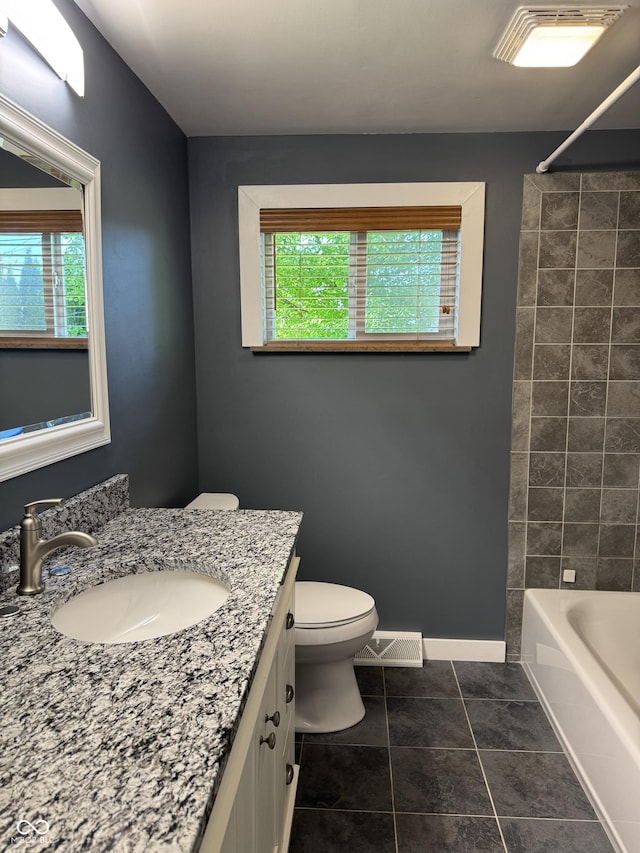 7897 Moore Rd, Indianapolis, IN 46278 - full bath featuring toilet, vanity, baseboards, tile patterned flooring, and bathing tub / shower combination