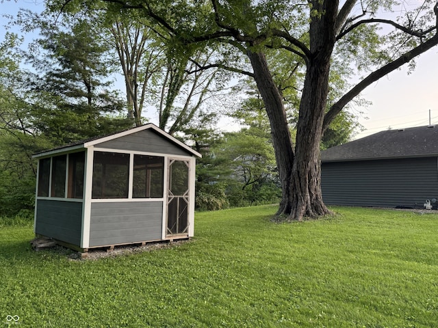 7897 Moore Rd, Indianapolis, IN 46278 - view of grassy yard with a sunroom