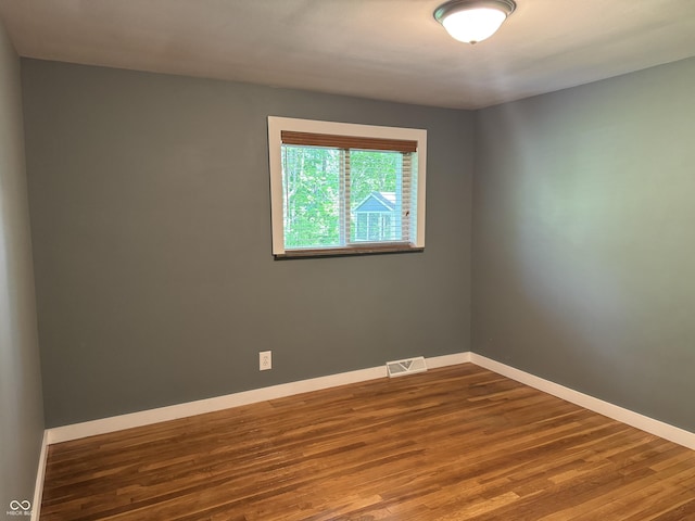 7897 Moore Rd, Indianapolis, IN 46278 - empty room with wood finished floors and baseboards