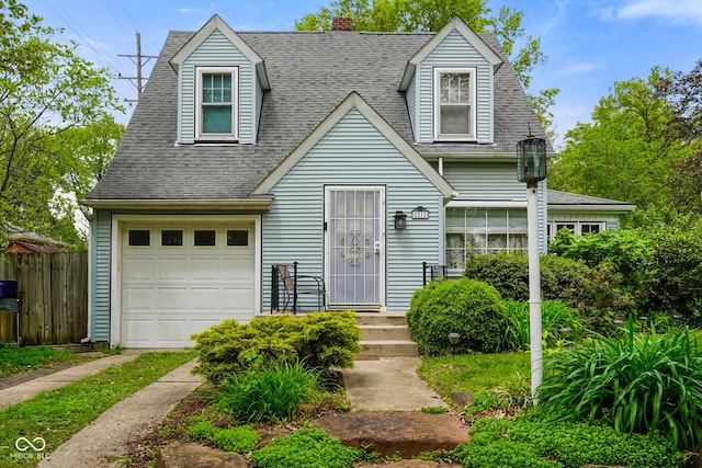 cape cod home with a chimney, roof with shingles, a garage, and fence