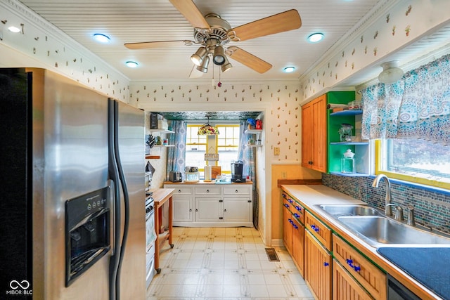 kitchen with a sink, open shelves, stainless steel fridge with ice dispenser, and a ceiling fan