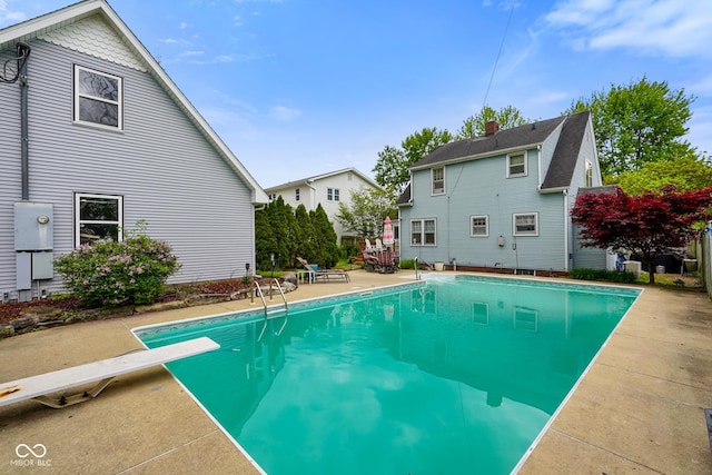outdoor pool with a patio