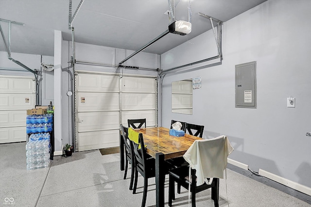 dining room with baseboards, speckled floor, and electric panel