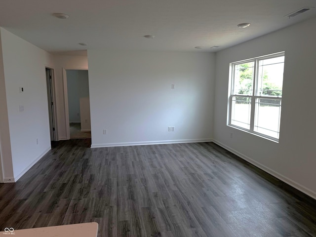 1400 Bluebonnet Pl, Shelbyville, IN 46176 - spare room with dark wood-style flooring
