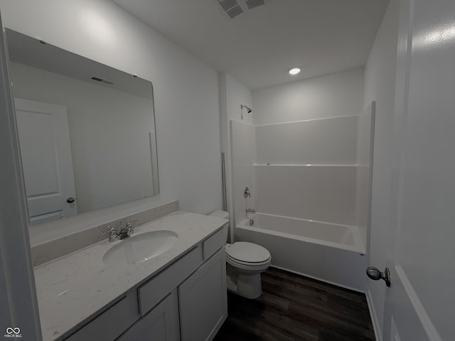 1400 Bluebonnet Pl, Shelbyville, IN 46176 - bathroom featuring vanity, wood finished floors, bathing tub / shower combination, and recessed lighting
