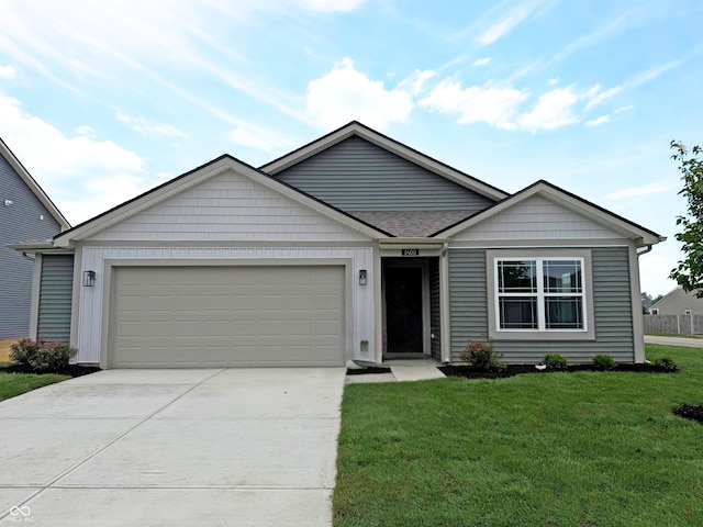 1400 Bluebonnet Pl, Shelbyville, IN 46176 - ranch-style home featuring driveway, an attached garage, and a front lawn