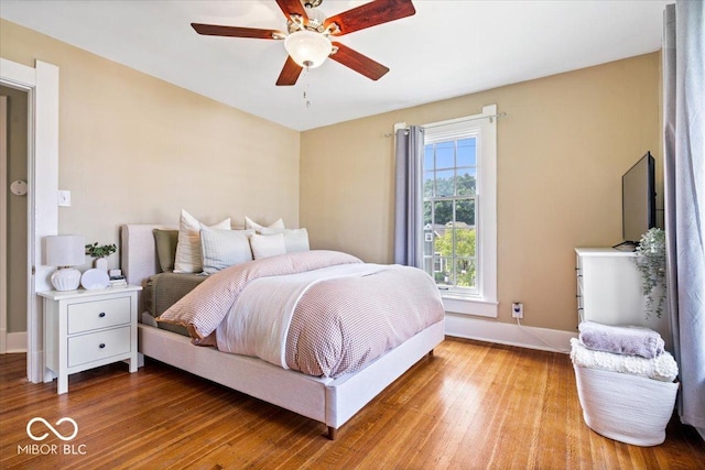 925 S State Ave, Indianapolis, IN 46203 - bedroom featuring wood finished floors, baseboards, and ceiling fan