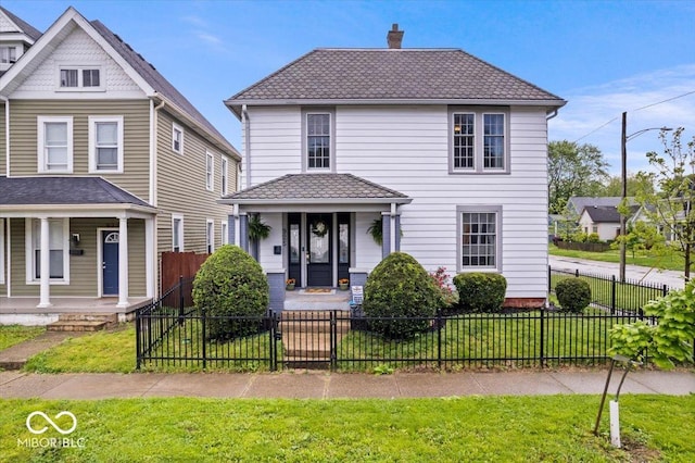 925 S State Ave, Indianapolis, IN 46203 - view of front of house featuring covered porch, a chimney, and a tiled roof