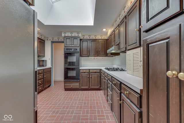 8903 Maple Hill Dr, Indianapolis, IN 46239 - kitchen with black appliances, brick patterned flooring, light countertops, recessed lighting, and dark brown cabinetry