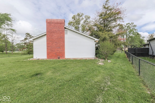 8903 Maple Hill Dr, Indianapolis, IN 46239 - view of yard featuring a detached garage
