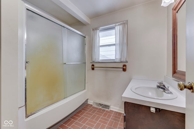 8903 Maple Hill Dr, Indianapolis, IN 46239 - full bathroom featuring baseboards, vanity, and enclosed tub / shower combo